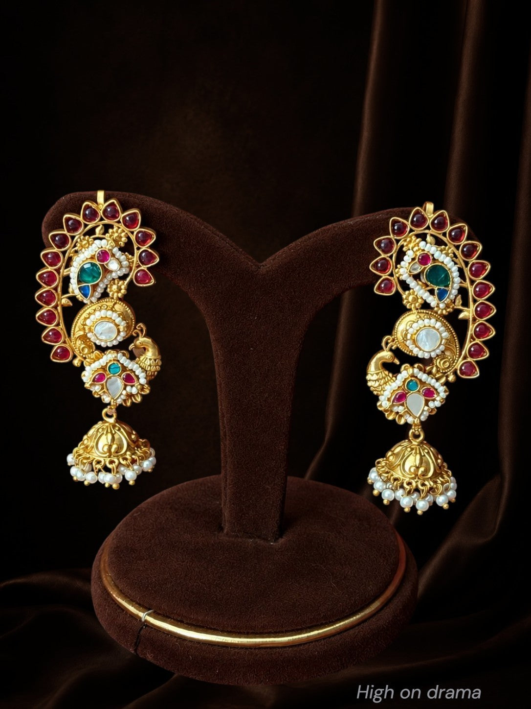 Amaira peacock statement earcuffs