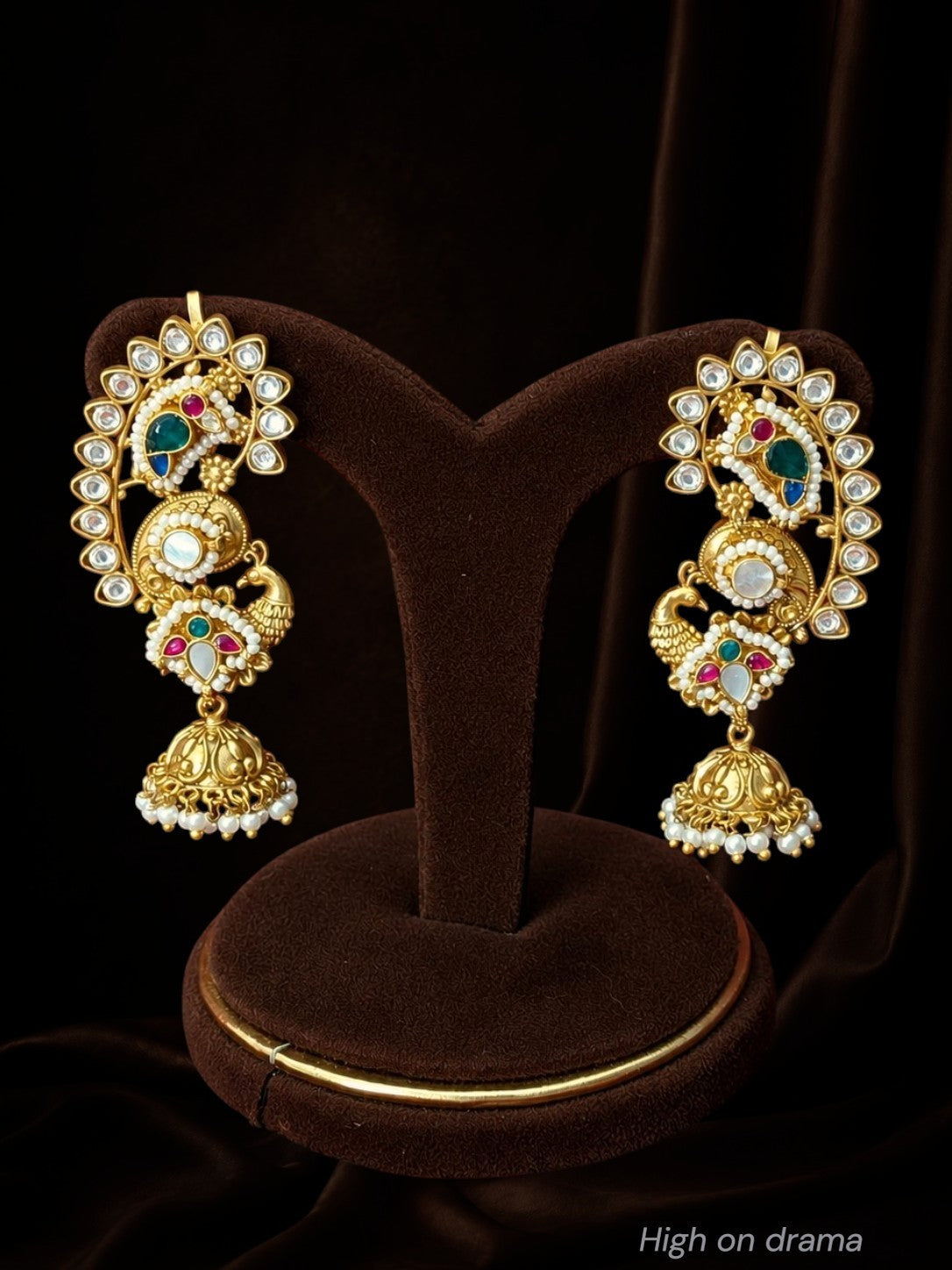Amaira peacock statement earcuffs