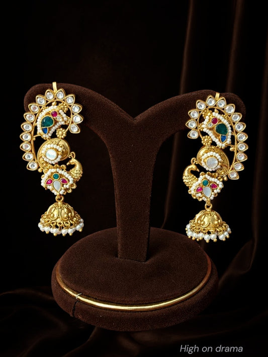 Amaira peacock statement earcuffs